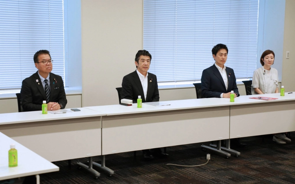 Kazuhiko Shigetoku (second from left), policy chief of the Constitutional Democratic Party, speaks at a meeting of opposition party policy leaders discussing a bill to scrap the provisional add-on gasoline tax rate, on Tuesday at parliament. Kazuhiko Shigetoku (second from left), policy chief of the Constitutional Democratic Party, speaks at a meeting of opposition party policy leaders discussing a bill to scrap the provisional add-on gasoline tax rate, on Tuesday at parliament.