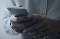 The National Police Agency noted in a special section of its fiscal 2025 report that the spread of social media has made it easy for loosely organized crime groups to contact regular citizens and commit crimes. | Getty Images