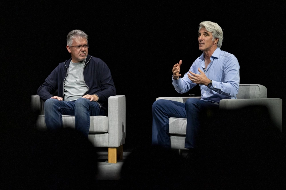 Apple executives John Giannandrea (left) and Craig Federighi. Shares of the company declined as much as 1.5% to $210.82, reaching a session low in New York trading. Apple executives John Giannandrea (left) and Craig Federighi. Shares of the company declined as much as 1.5% to $210.82, reaching a session low in New York trading.