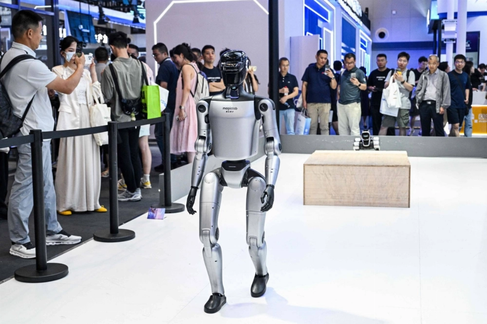 A Magic Bot Z1 by Magiclab is displayed at the World Artificial Intelligence Conference at the Shanghai World Expo and Convention Center on Tuesday. A Magic Bot Z1 by Magiclab is displayed at the World Artificial Intelligence Conference at the Shanghai World Expo and Convention Center on Tuesday.