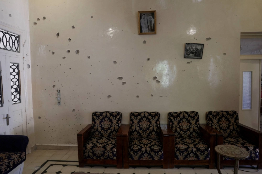 A wall is pockmarked by bullet holes following sectarian violence in the predominantly Druze city of Sweida, Syria, on July 25. A wall is pockmarked by bullet holes following sectarian violence in the predominantly Druze city of Sweida, Syria, on July 25.