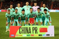 China players pose for a photo before a World Cup qualifying match against Thailand at Rajamangala National Stadium in Bangkok on Nov. 16, 2023. President Xi Jinping's anti-corruption drive has ensnared several high-profile figures involved in the country's struggle to build a successful men's national soccer team. | Reuters