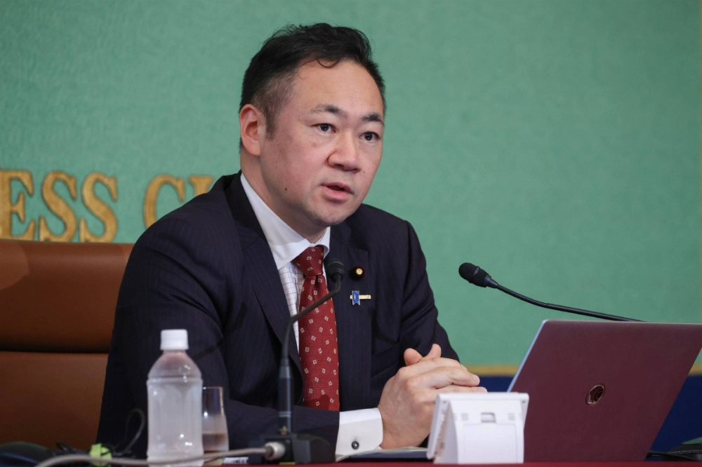 Justice Minister Keisuke Suzuki attends a news conference at the Japan National Press Club in Tokyo on Wednesday. Justice Minister Keisuke Suzuki attends a news conference at the Japan National Press Club in Tokyo on Wednesday.