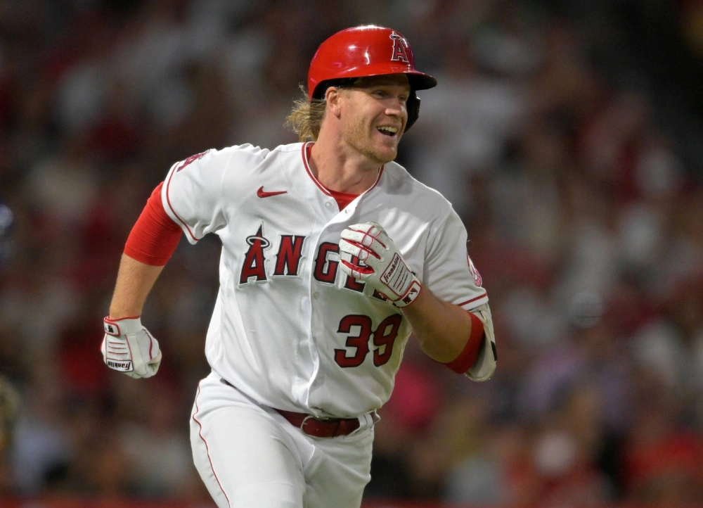 The Angels David MacKinnon runs to first after recording an RBI single for his first MLB hit on June 22, 2022. The Angels David MacKinnon runs to first after recording an RBI single for his first MLB hit on June 22, 2022.