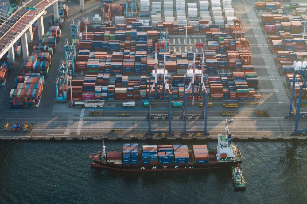 A container ship approaches the Busan Port Terminal in Busan, South Korea, on July 23. Seoul's trade agreement with the U.S. brings one of the world’s biggest exporters into Washington’s emerging trade framework just a day before the deadline. A container ship approaches the Busan Port Terminal in Busan, South Korea, on July 23. Seoul's trade agreement with the U.S. brings one of the world’s biggest exporters into Washington’s emerging trade framework just a day before the deadline.