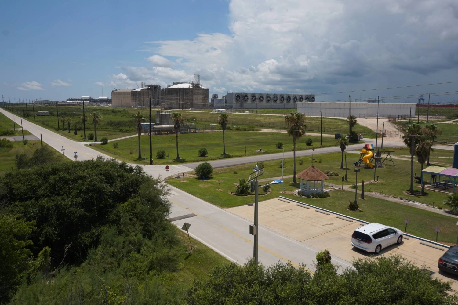 A children's playground next to the Freeport LNG export terminal in Texas. Existing socioeconomic disparities are being exacerbated as American LNG facilities “tend to be sited in areas that are disproportionately home to communities of color and low-income communities,” according to a U.S. Department of Energy study.  A children's playground next to the Freeport LNG export terminal in Texas. Existing socioeconomic disparities are being exacerbated as American LNG facilities “tend to be sited in areas that are disproportionately home to communities of color and low-income communities,” according to a U.S. Department of Energy study.