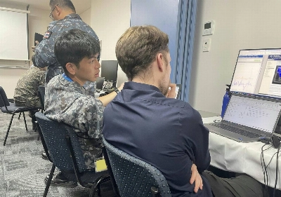 Japan's Air Self-Defense Force takes part in a multinational tabletop space defense exercise in Townsville, Australia, in July.  Japan's Air Self-Defense Force takes part in a multinational tabletop space defense exercise in Townsville, Australia, in July.