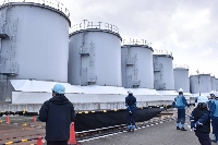 Tanks of treated water at the Fukushima No. 1 nuclear power plant in February | POOL / VIA JIJI