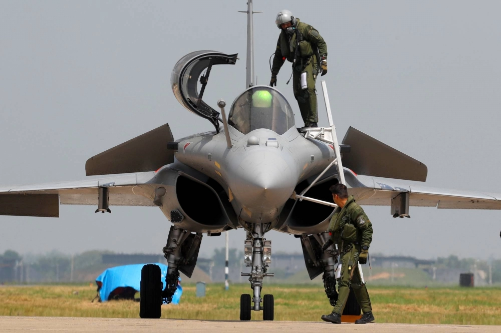 An Indian Air Force pilot gets out of a Rafale fighter jet during its induction ceremony at an air force station in Ambala, India, September 2020. An Indian Air Force pilot gets out of a Rafale fighter jet during its induction ceremony at an air force station in Ambala, India, September 2020.