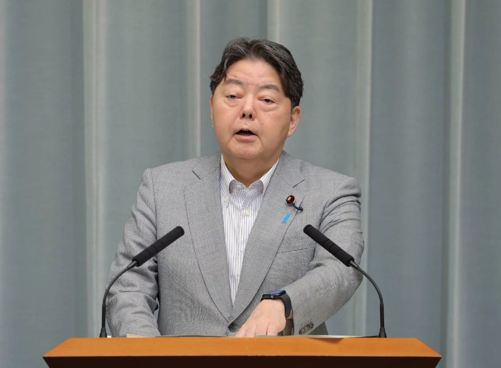 Chief Cabinet Secretary Yoshimasa Hayashi speaks during a news conference at the Prime Minister's Office on Monday. Chief Cabinet Secretary Yoshimasa Hayashi speaks during a news conference at the Prime Minister's Office on Monday.