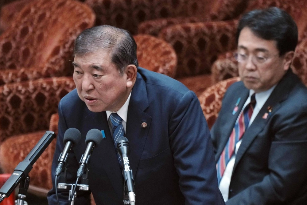 Prime Minister Shigeru Ishiba (left) and Economic Revitalization Minister and chief tariff negotiator Ryosei Akazawa attend a budget committee session on the U.S. tariff issue in the Lower House in Tokyo on Monday. Prime Minister Shigeru Ishiba (left) and Economic Revitalization Minister and chief tariff negotiator Ryosei Akazawa attend a budget committee session on the U.S. tariff issue in the Lower House in Tokyo on Monday.