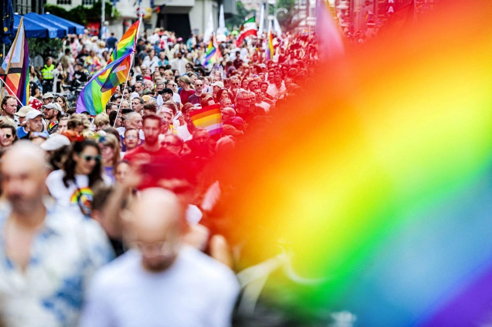 Participants take part in the Pride March in Amsterdam on July 26.  Participants take part in the Pride March in Amsterdam on July 26.