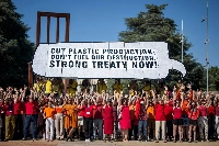 Activists stage a demonstration in front of the United Nations Offices in Geneva on Monday. | AFP-JIJI