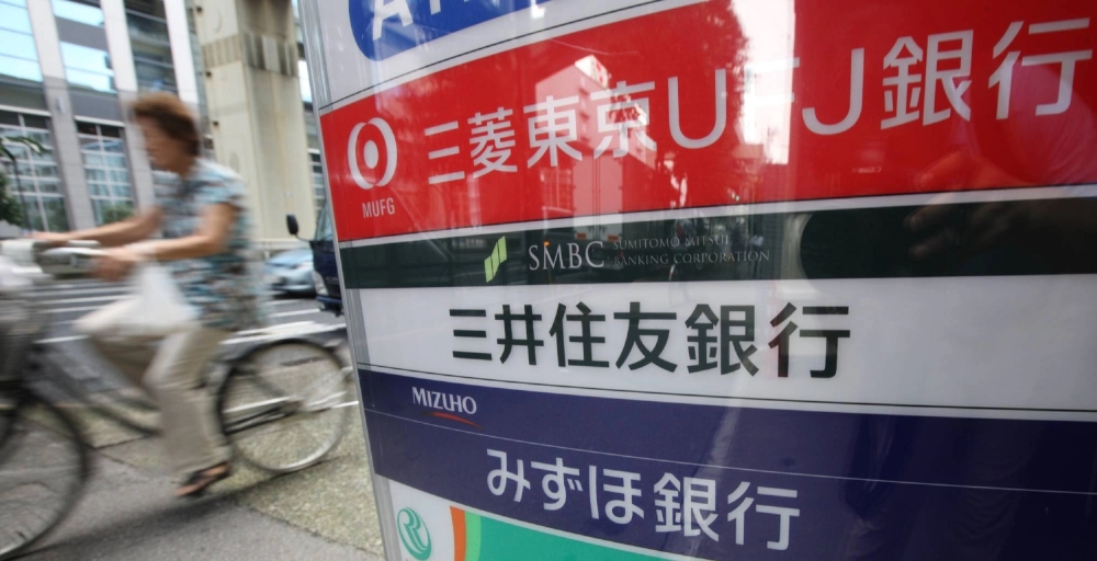 Japan's three megabank groups have estimated that the tariffs imposed by the administration of U.S. President Donald Trump could cut their fiscal 2025 profits by around ¥80 billion ($544 billion) to ¥110 billion. Japan's three megabank groups have estimated that the tariffs imposed by the administration of U.S. President Donald Trump could cut their fiscal 2025 profits by around ¥80 billion ($544 billion) to ¥110 billion.