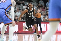 Spurs guard De'Aaron Fox with the ball in the first half against the Oklahoma City Thunder at Frost Bank Center in San Antonio, Texas on March 2 | Imagn Images / via Reuters