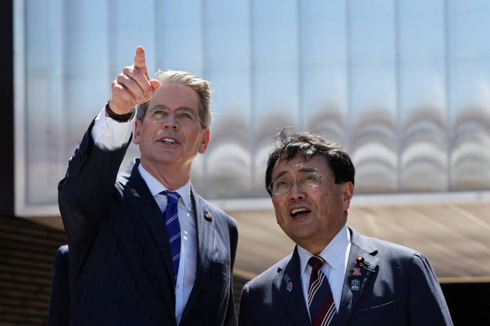 U.S. Secretary of the Treasury Scott Bessent and Economic Revitalization Minister Ryosei Akazawa. Akazawa, Japan's chief tariff negotiator, is returning to the United States for another round of trade talks. U.S. Secretary of the Treasury Scott Bessent and Economic Revitalization Minister Ryosei Akazawa. Akazawa, Japan's chief tariff negotiator, is returning to the United States for another round of trade talks.