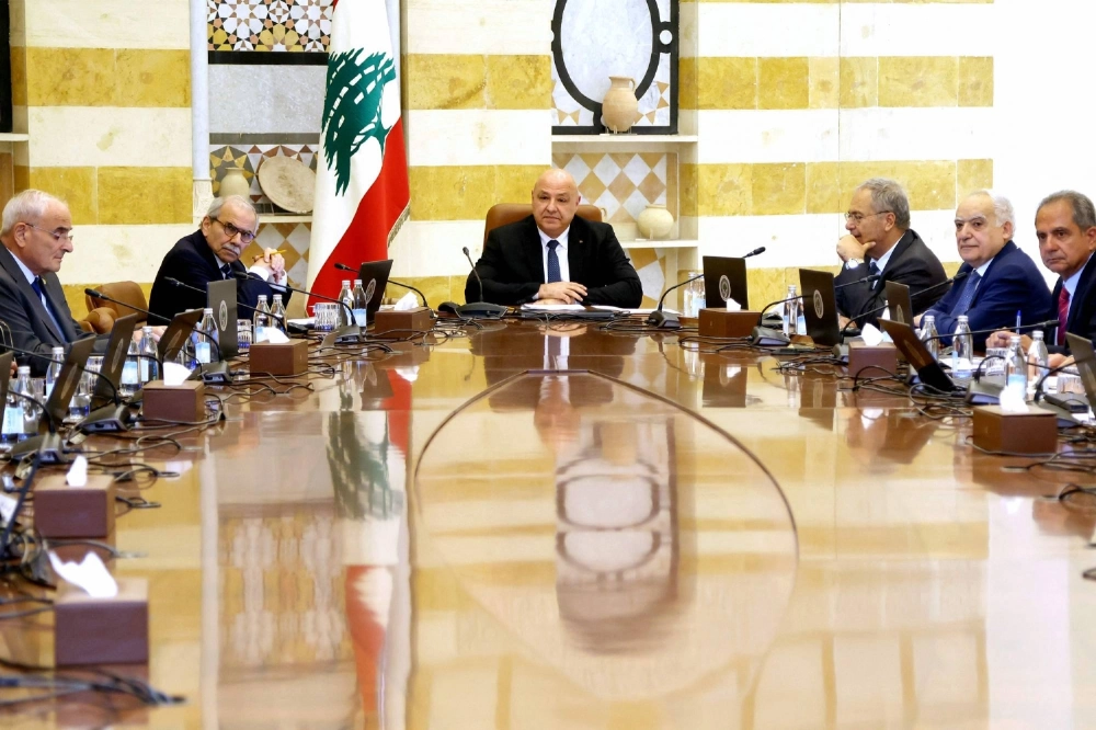 Lebanese President Joseph Aoun (center) chairs a meeting of a Cabinet session to discuss the issue of disarming Hezbollah at the presidential palace of Baabda, east of Beirut, on Aug. 5.  Lebanese President Joseph Aoun (center) chairs a meeting of a Cabinet session to discuss the issue of disarming Hezbollah at the presidential palace of Baabda, east of Beirut, on Aug. 5.