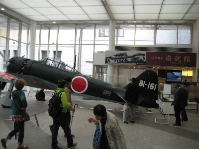 A carrier-based Type 52 Zero fighter marks the entrance foyer of Yasukuni Shrine's Yushukan, a museum that tells a more nuanced story of Japan's experience in World War II than the controversies around the shrine might suggest. A carrier-based Type 52 Zero fighter marks the entrance foyer of Yasukuni Shrine's Yushukan, a museum that tells a more nuanced story of Japan's experience in World War II than the controversies around the shrine might suggest.