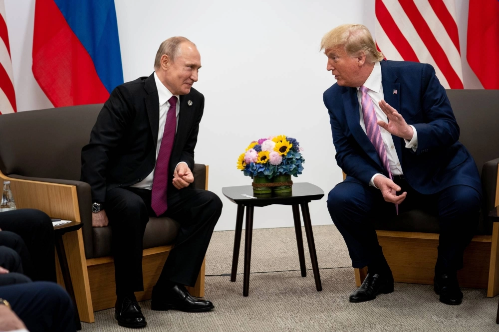 Russian President Vladimir Putin and U.S. President Donald Trump meet at the G20 summit in Osaka in 2019.  Russian President Vladimir Putin and U.S. President Donald Trump meet at the G20 summit in Osaka in 2019.