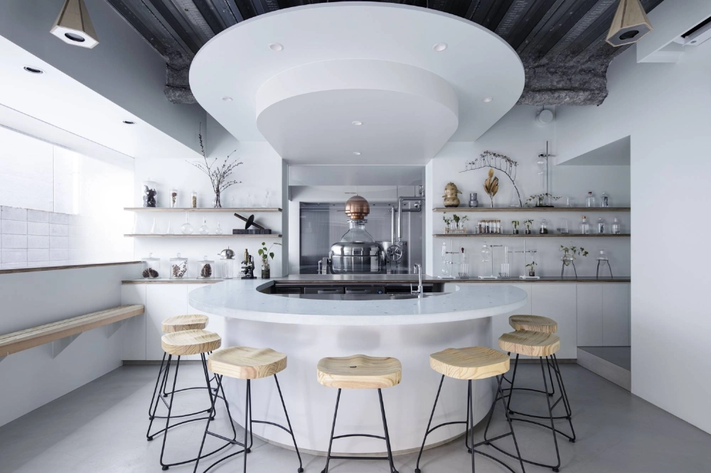 Fukagawa Distillery's bar offers a view of the distillation still behind its walls. Fukagawa Distillery's bar offers a view of the distillation still behind its walls.