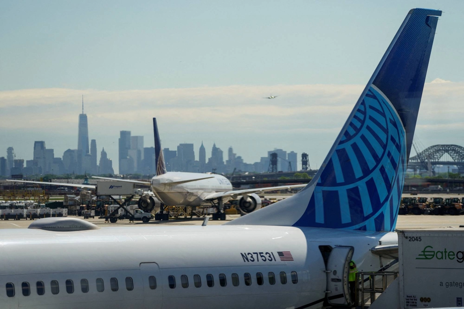 A United Airlines plane on the tarmac of Newark International Airport A United Airlines plane on the tarmac of Newark International Airport