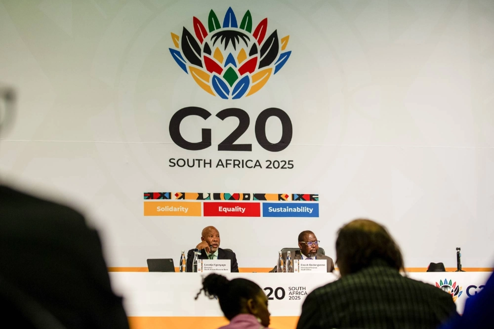 South African Finance Minister Enoch Godongwana (right) and the country’s reserve bank governor, Lesetja Kganyago, attend the Group of 20 Finance Ministers and Central Bank Governors Meeting in Cape Town on Feb. 27.   South African Finance Minister Enoch Godongwana (right) and the country’s reserve bank governor, Lesetja Kganyago, attend the Group of 20 Finance Ministers and Central Bank Governors Meeting in Cape Town on Feb. 27.
