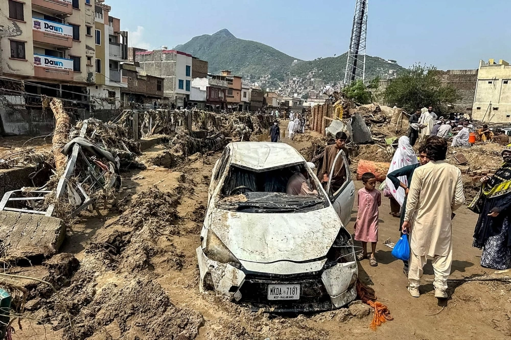 People gather in Mingora, the main city of Swat Valley, in monsoon-hit northern Pakistan's mountainous Khyber Pakhtunkhwa province on Saturday. People gather in Mingora, the main city of Swat Valley, in monsoon-hit northern Pakistan's mountainous Khyber Pakhtunkhwa province on Saturday.