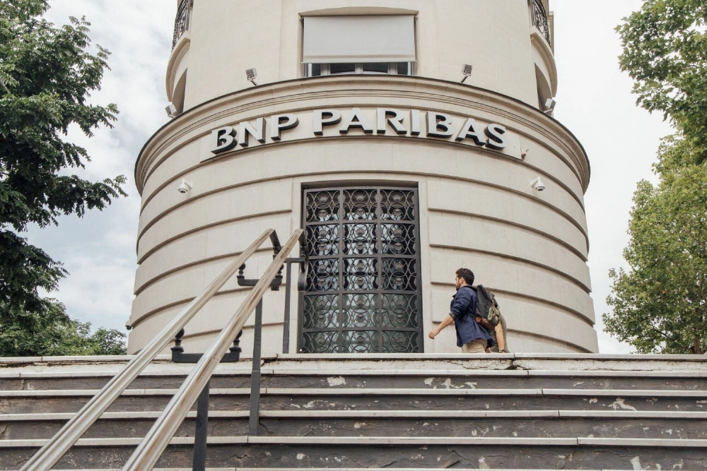 A BNP Paribas branch in Paris. The EU’s biggest bank by assets was questioning the value of continued Net-Zero Banking Alliance membership as recently as June. A BNP Paribas branch in Paris. The EU’s biggest bank by assets was questioning the value of continued Net-Zero Banking Alliance membership as recently as June.
