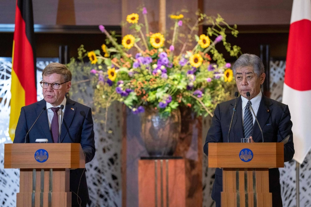 German Foreign Minister Johann Wadephul (left) and Foreign Minister Takeshi Iwaya attend a joint press event at the Iikura Guest House in Tokyo on Monday. German Foreign Minister Johann Wadephul (left) and Foreign Minister Takeshi Iwaya attend a joint press event at the Iikura Guest House in Tokyo on Monday.