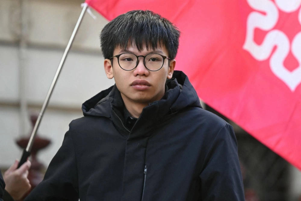 Political activist Tony Chung attends a demonstration outside the Foreign and Commonwealth Development Office in London to protest the introduction of Hong Kong's Article 23 national security law on March 23, 2024. Political activist Tony Chung attends a demonstration outside the Foreign and Commonwealth Development Office in London to protest the introduction of Hong Kong's Article 23 national security law on March 23, 2024.
