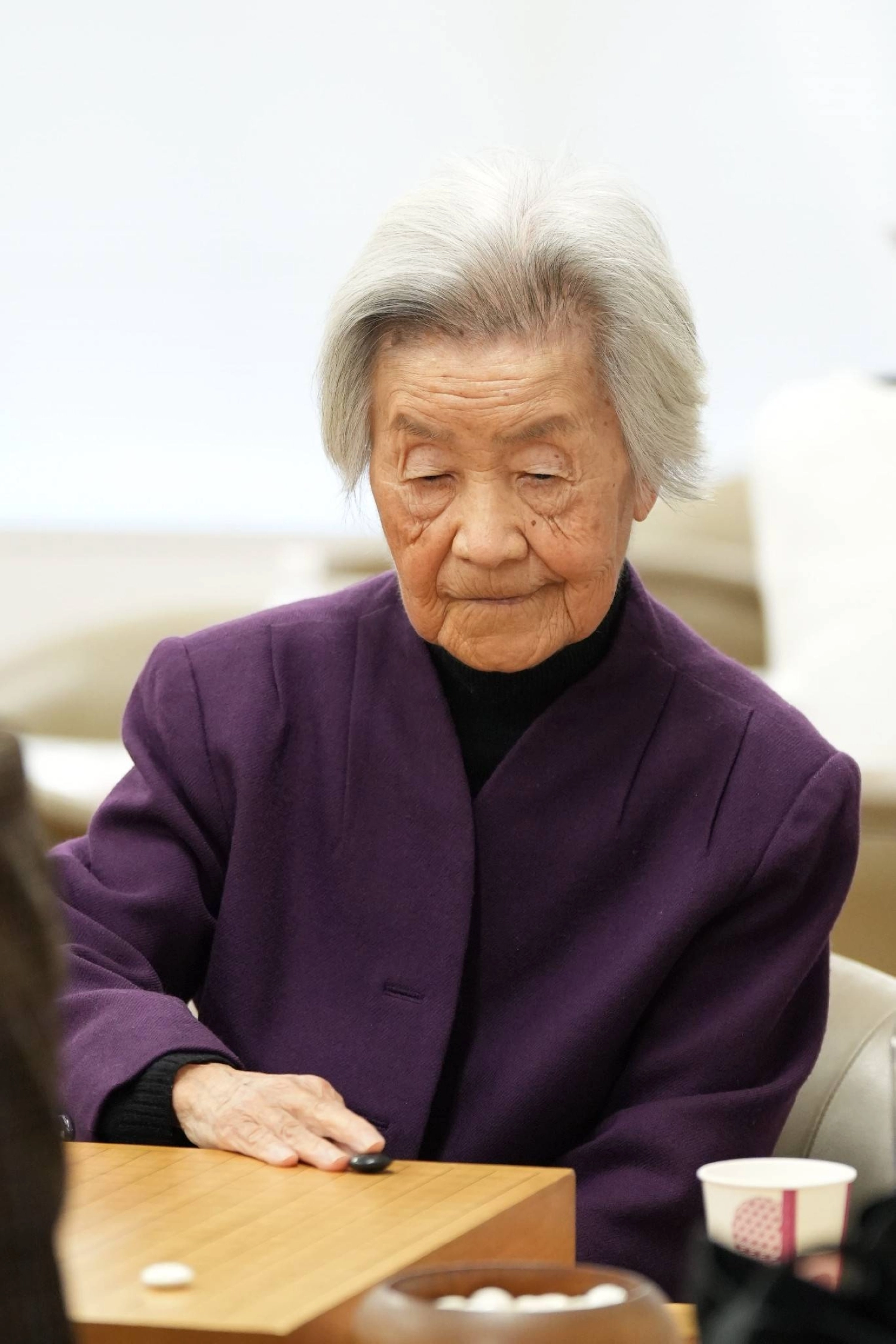 Eighth dan go player Kazuko Sugiuchi during a match in Tokyo in January last year Eighth dan go player Kazuko Sugiuchi during a match in Tokyo in January last year