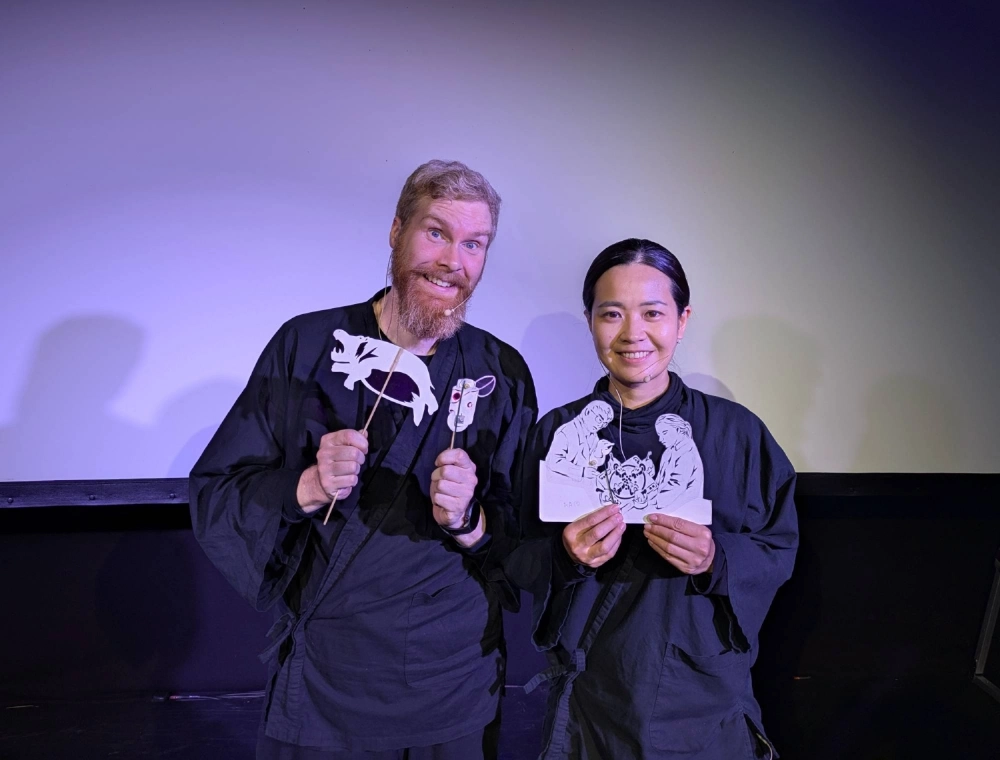 Seri Yanai and Daniel Wishes founded the shadow puppetry company Mochinosha in 2012 when they were students at the London School of Puppetry. Seri Yanai and Daniel Wishes founded the shadow puppetry company Mochinosha in 2012 when they were students at the London School of Puppetry.