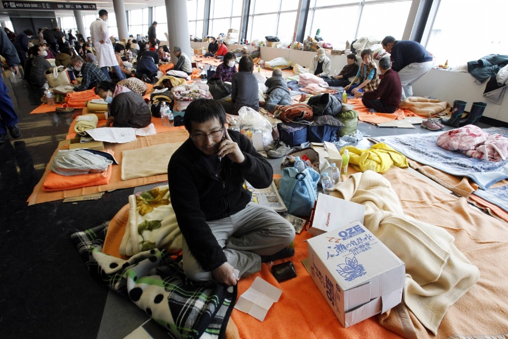 Evacuees at a shelter in Saitama Prefecture after the 2011 Great East Japan Earthquake in March 2011. With a tsunami expected to reach some areas within minutes after a Nankai Trough megaquake, the government is asking municipalities to designate areas where advance evacuation is necessary. Evacuees at a shelter in Saitama Prefecture after the 2011 Great East Japan Earthquake in March 2011. With a tsunami expected to reach some areas within minutes after a Nankai Trough megaquake, the government is asking municipalities to designate areas where advance evacuation is necessary.