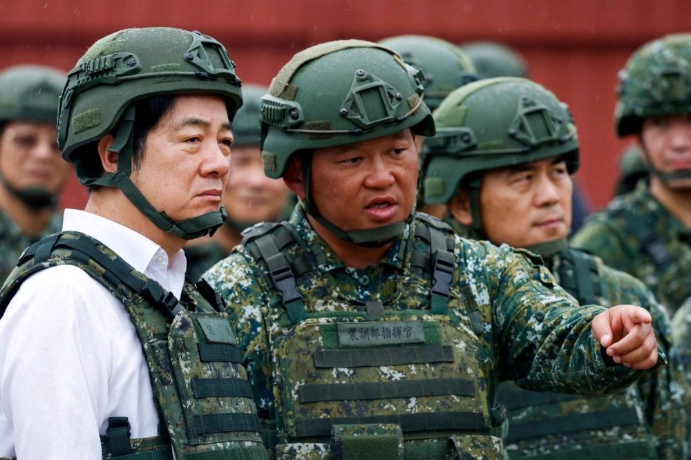 A soldier speaks to Taiwanese President Lai Ching-te in Hsinchu, Taiwan, on July 10. A soldier speaks to Taiwanese President Lai Ching-te in Hsinchu, Taiwan, on July 10.