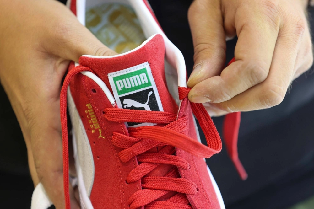 Founded in 1948, Puma reported €281.6 million in net income last year and €8.8 billion in sales, and counts a global workforce of roughly 22,000. Founded in 1948, Puma reported €281.6 million in net income last year and €8.8 billion in sales, and counts a global workforce of roughly 22,000.