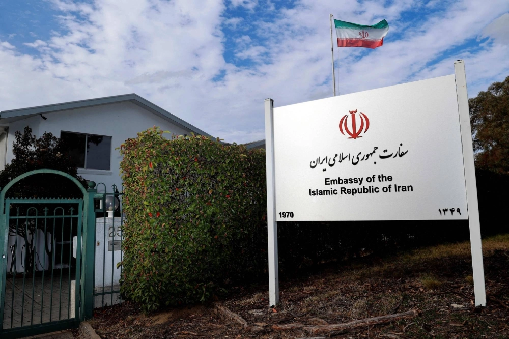 Iran's national flag flies over the Iranian embassy in Canberra on Tuesday, the day Australia's government said it is expelling Iran's ambassador, accusing the country of being behind antisemitic attacks in Melbourne and Sydney.  Iran's national flag flies over the Iranian embassy in Canberra on Tuesday, the day Australia's government said it is expelling Iran's ambassador, accusing the country of being behind antisemitic attacks in Melbourne and Sydney.