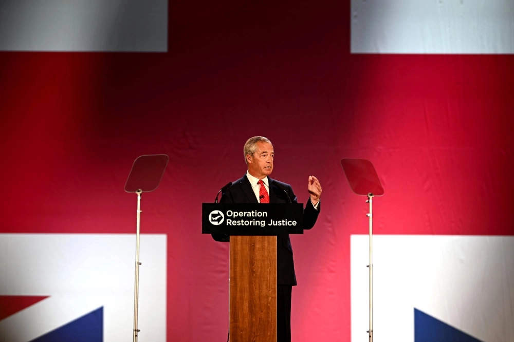 Nigel Farage in Oxford, U.K., on Tuesday. His Reform party would carry out the mass deportations of asylum-seekers and remove Britain from the European Convention on Human Rights while also scrapping the country’s Human Rights Act, he said. Nigel Farage in Oxford, U.K., on Tuesday. His Reform party would carry out the mass deportations of asylum-seekers and remove Britain from the European Convention on Human Rights while also scrapping the country’s Human Rights Act, he said.