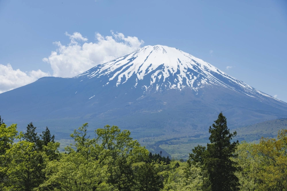 Kokichi Akuzawa, a 102-year-old Japanese man with a serious hear condition, has been certified as the oldest person to climb Mount Fuji.  Kokichi Akuzawa, a 102-year-old Japanese man with a serious hear condition, has been certified as the oldest person to climb Mount Fuji.