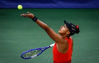 Naomi Osaka serves the ball to Greet Minnen during their first round match at the U.S. Open in New York on Tuesday. | AFP-JIJI