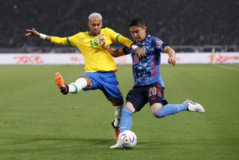 Brazil's Neymar (left) in action with Japan's Yuta Nakayama during a friendly game at National Stadium in Tokyo on June 6, 2022 Brazil's Neymar (left) in action with Japan's Yuta Nakayama during a friendly game at National Stadium in Tokyo on June 6, 2022