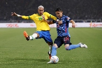 Brazil's Neymar (left) in action with Japan's Yuta Nakayama during a friendly game at National Stadium in Tokyo on June 6, 2022 | REUTERS