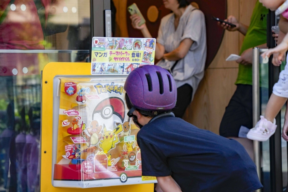A boy looks at samples of Pokemon toys available with the McDonald's Happy Meal set in Tokyo earlier this month.  A boy looks at samples of Pokemon toys available with the McDonald's Happy Meal set in Tokyo earlier this month.