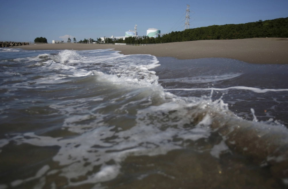 Kyushu Electric Power's Sendai nuclear power plant is seen from the shoreline in Satsumasendai, Kagoshima Prefecture. Kyushu Electric Power's Sendai nuclear power plant is seen from the shoreline in Satsumasendai, Kagoshima Prefecture.