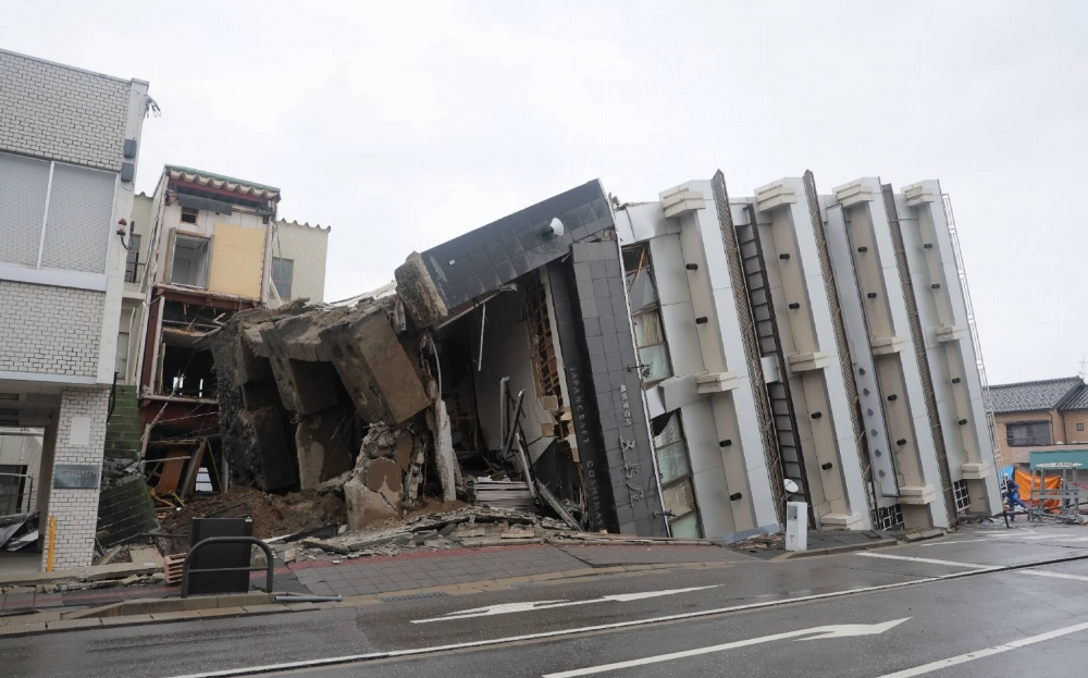 A building that collapsed after the Noto Peninsula earthquakes in January 2024. The government plans to support residents of areas at high risk of fire who buy earthquake-sensitive breakers to prevent blazes caused by short circuits, sources say. A building that collapsed after the Noto Peninsula earthquakes in January 2024. The government plans to support residents of areas at high risk of fire who buy earthquake-sensitive breakers to prevent blazes caused by short circuits, sources say.