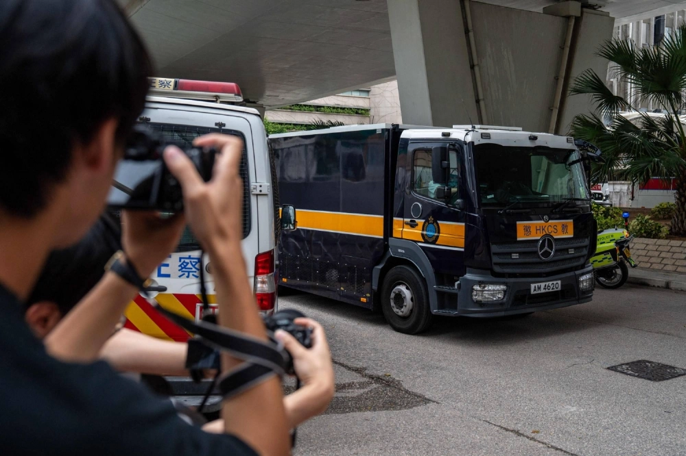 A correctional services van holding media tycoon Jimmy Lai arrives at the West Kowloon court for his national security trial in Hong Kong on Thursday. A correctional services van holding media tycoon Jimmy Lai arrives at the West Kowloon court for his national security trial in Hong Kong on Thursday.