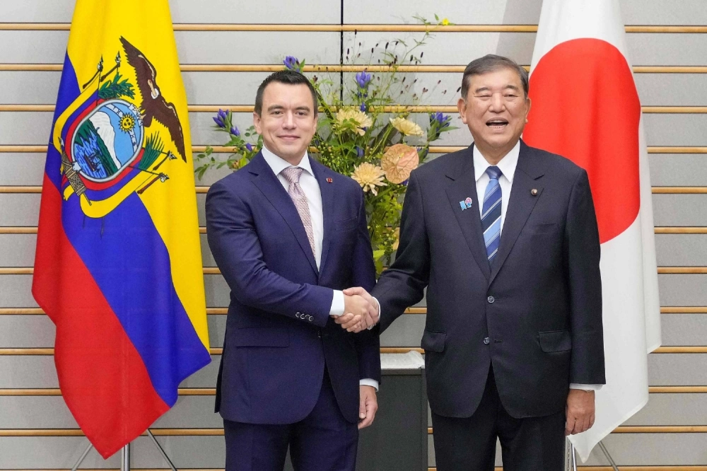 Ecuador's President Daniel Noboa shakes hands with Prime Minister Shigeru Ishiba before their meeting at the Prime Minister's Office in Tokyo on Thursday. Ecuador's President Daniel Noboa shakes hands with Prime Minister Shigeru Ishiba before their meeting at the Prime Minister's Office in Tokyo on Thursday.