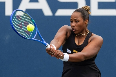 Taylor Townsend hits a shot against Jelena Ostapenko during their match at the U.S. Open on Wednesday. Taylor Townsend hits a shot against Jelena Ostapenko during their match at the U.S. Open on Wednesday.