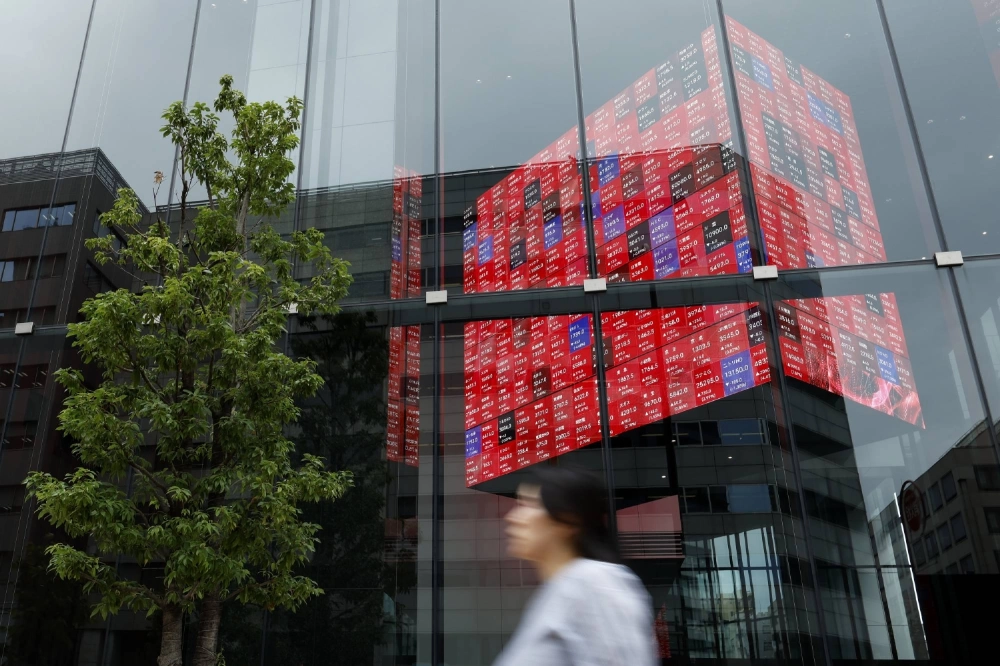 Despite political uncertainty in Japan, investors in the stock market are banking on an economy that is finally gaining momentum after years of stagnation. Despite political uncertainty in Japan, investors in the stock market are banking on an economy that is finally gaining momentum after years of stagnation.