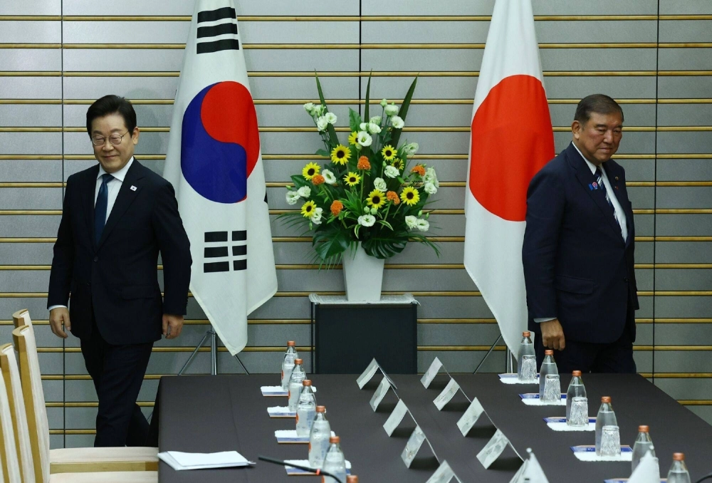 South Korean President Lee Jae Myung and Prime Minister Shigeru Ishiba meet in Tokyo on Aug. 23, before Lee traveled to Washington for a summit with U.S. President Donald Trump. South Korean President Lee Jae Myung and Prime Minister Shigeru Ishiba meet in Tokyo on Aug. 23, before Lee traveled to Washington for a summit with U.S. President Donald Trump.