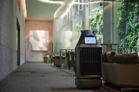 A robot serves as a porter at Mita Garden Hills, a large apartment in Tokyo. | MITSUI FUDOSAN RESIDENTIAL / JIJI